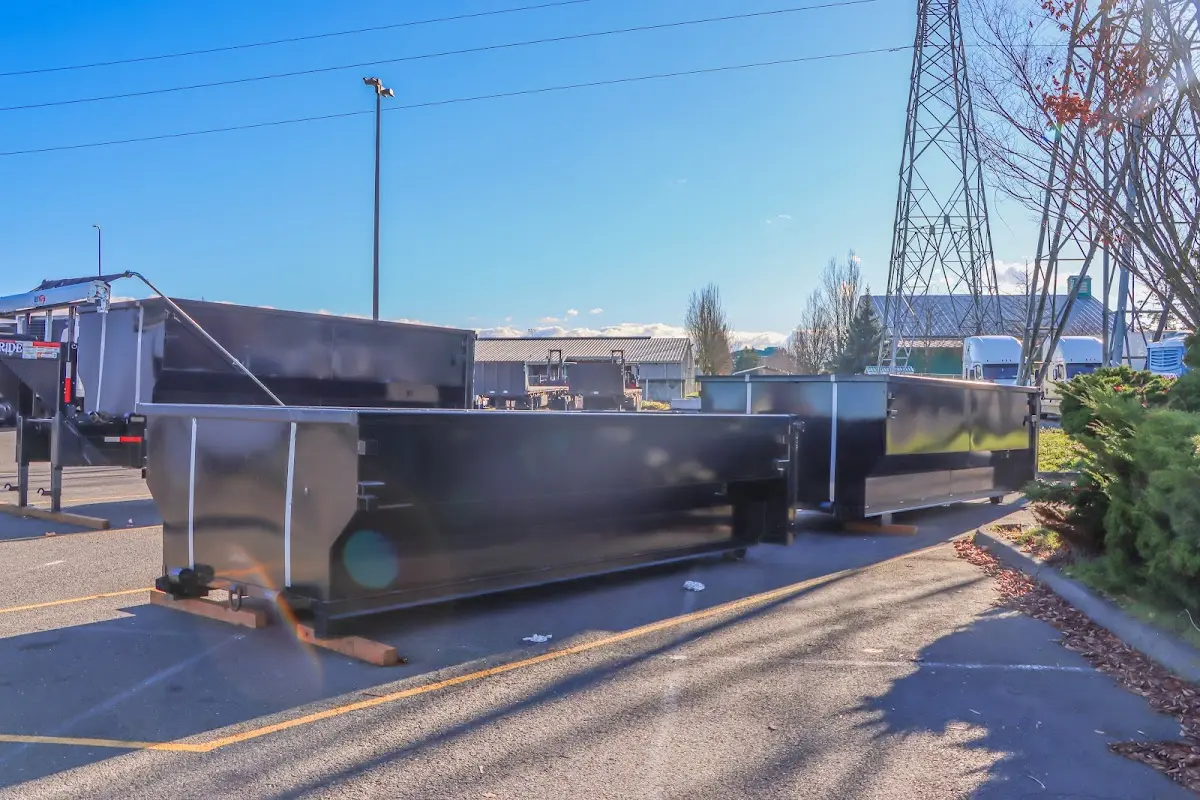 Roll-off dumpster ready for waste disposal at job site for 3 Yard Dumpster Rental in Evanston